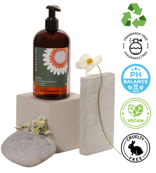Dandylion gentle dog shampoo bottle on beige blocks with flowers and vegan fragrance free icons