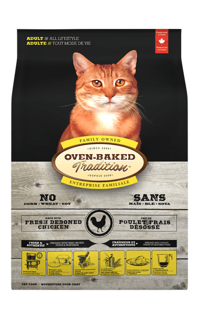 Oven Baked Tradition Adult Chicken Dry Cat Food in a bag featuring a cat on the front with healthy ingredients