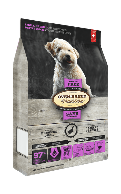 Oven Baked Tradition oven baked duck dry dog food small breed in a bag with a happy dog image