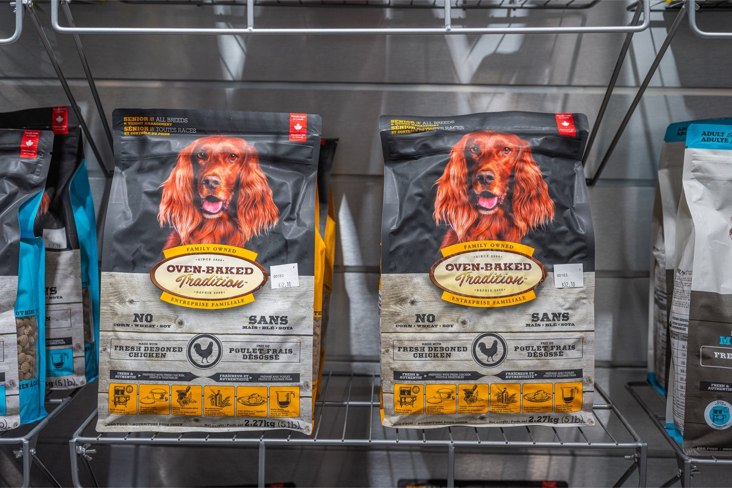 Oven Baked Tradition oven baked senior chicken dog food bags with red retriever dog image on shelf