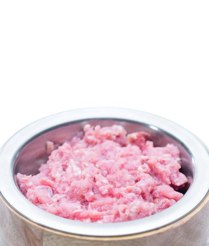 Raw Performance pure rabbit raw dog food in a silver bowl, rich in protein for healthy dogs