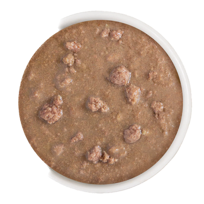 Weruva BFF Text Me cat food showing chunky wet canned food in a white bowl