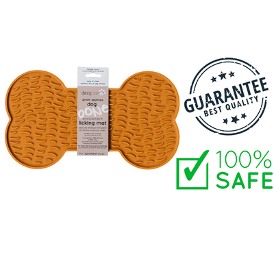 Dexypaws dog bone licking mat in orange with textured surface for dog enrichment and safe chewing