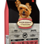 Oven Baked Adult Small Breed Lamb Dog Food in a bag featuring a happy small dog on the front