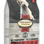 Oven Baked Tradition small breed meat dog food in a bag featuring a dog and highlighting grain-free qualities
