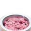 Raw Performance gourmet beef raw dog food in a stainless steel bowl, fresh and nutritious for dogs