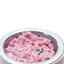 Raw Performance Gourmet turkey dog food shown in a stainless steel bowl, designed for nutritious pet meals