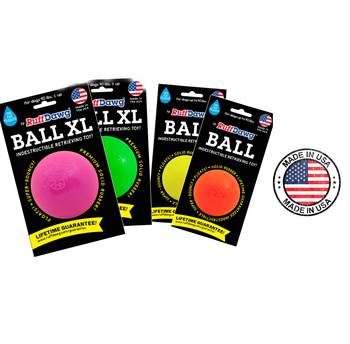Ruff Dawg indestructible dog ball toy in pink, green, and orange with lifetime guarantee packaging