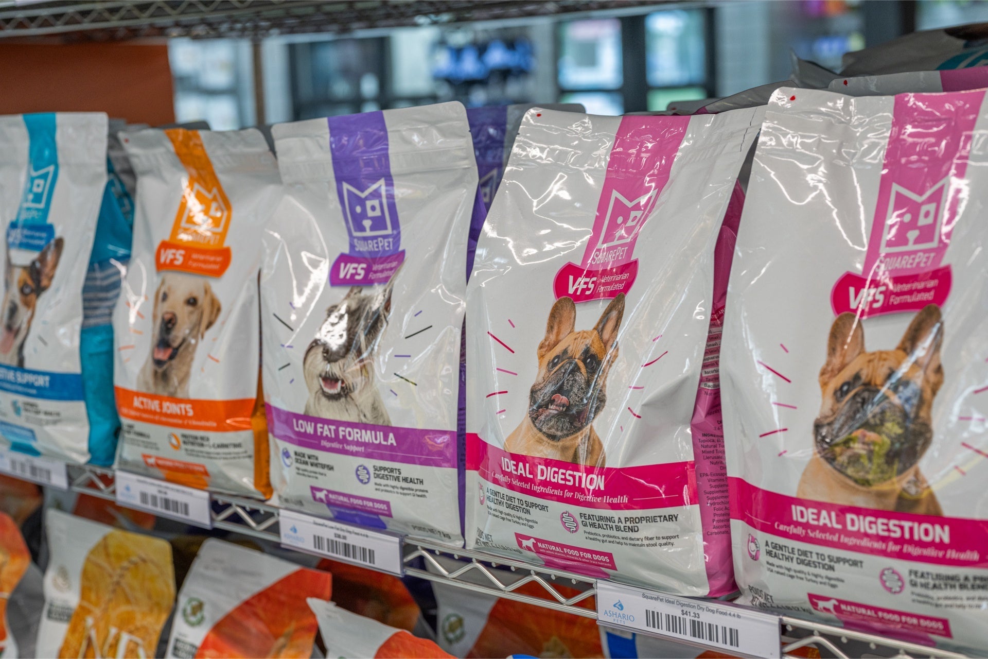 SquarePet low fat dog food options displayed on a shelf for healthy canine nutrition